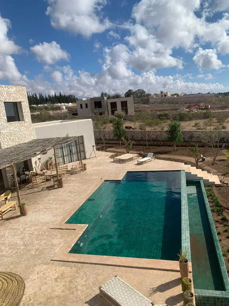 modern swimming pool integrated with villa architecture in Essaouira